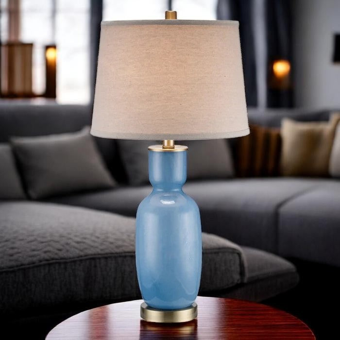 Glossy Blue Ceramic Table Lamp with Neutral Shade