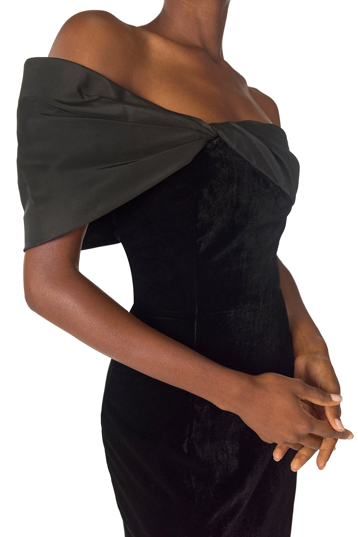 Monique Lhuillier Fall 2024 asymmetric, off the shoulder sheath dress in noir silk faille and velvet with draped twist detail at neckline - neckline.