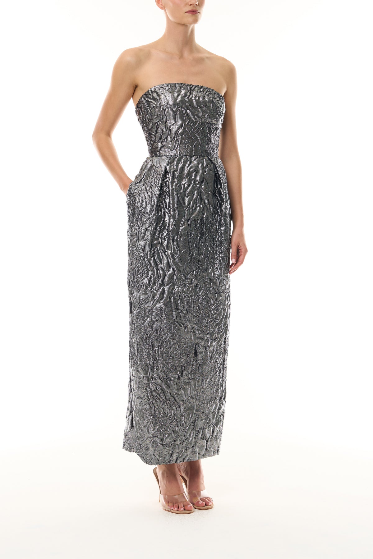Monique Lhuillier Fall 2026 Chrome Lamé Rose Jacquard Strapless pleated cocktail dress with pockets - side.
