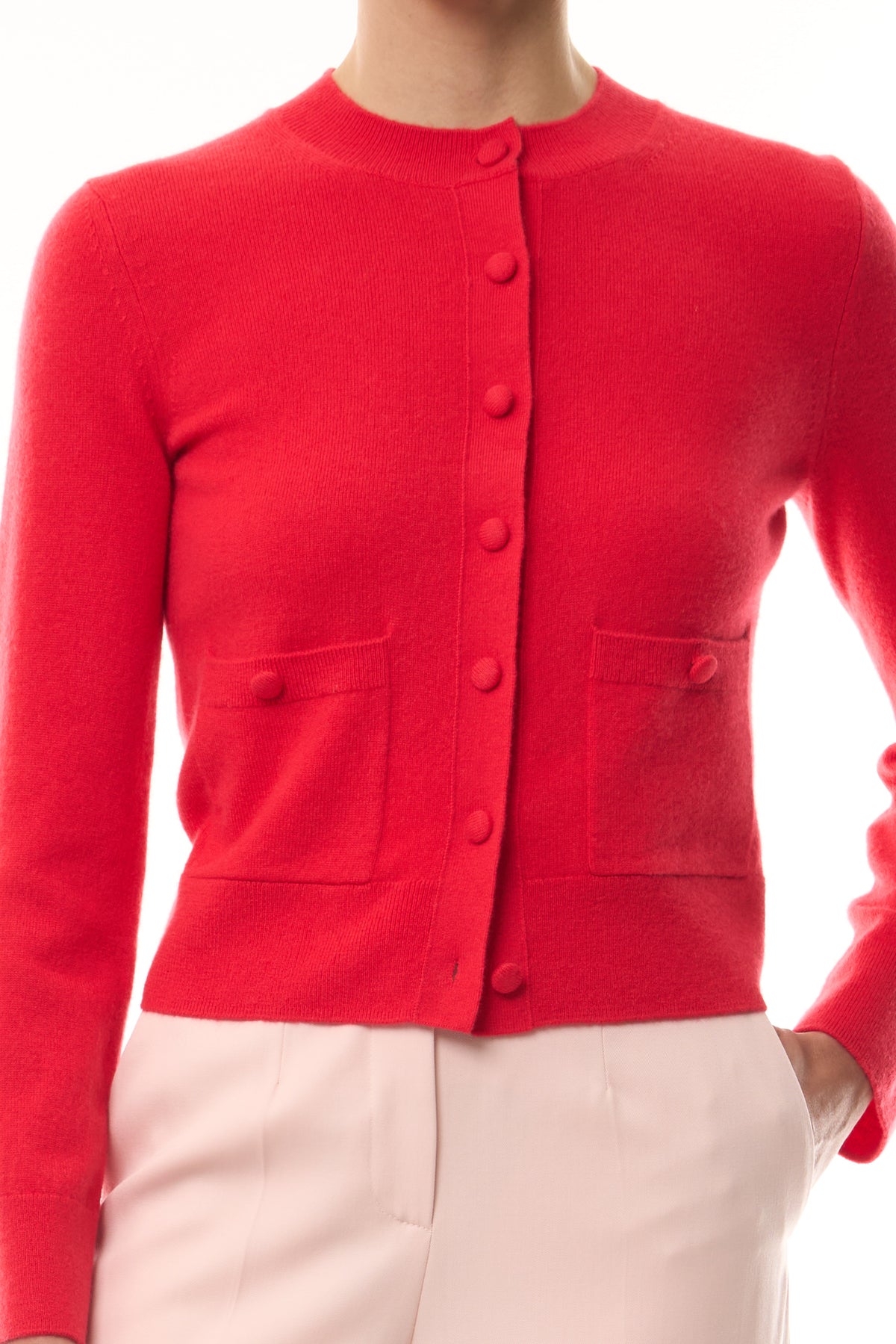 Monique Lhuillier Spring 2026 long sleeve Poppy Cashmere Cardigan with pockets and button front closure- fabric.
