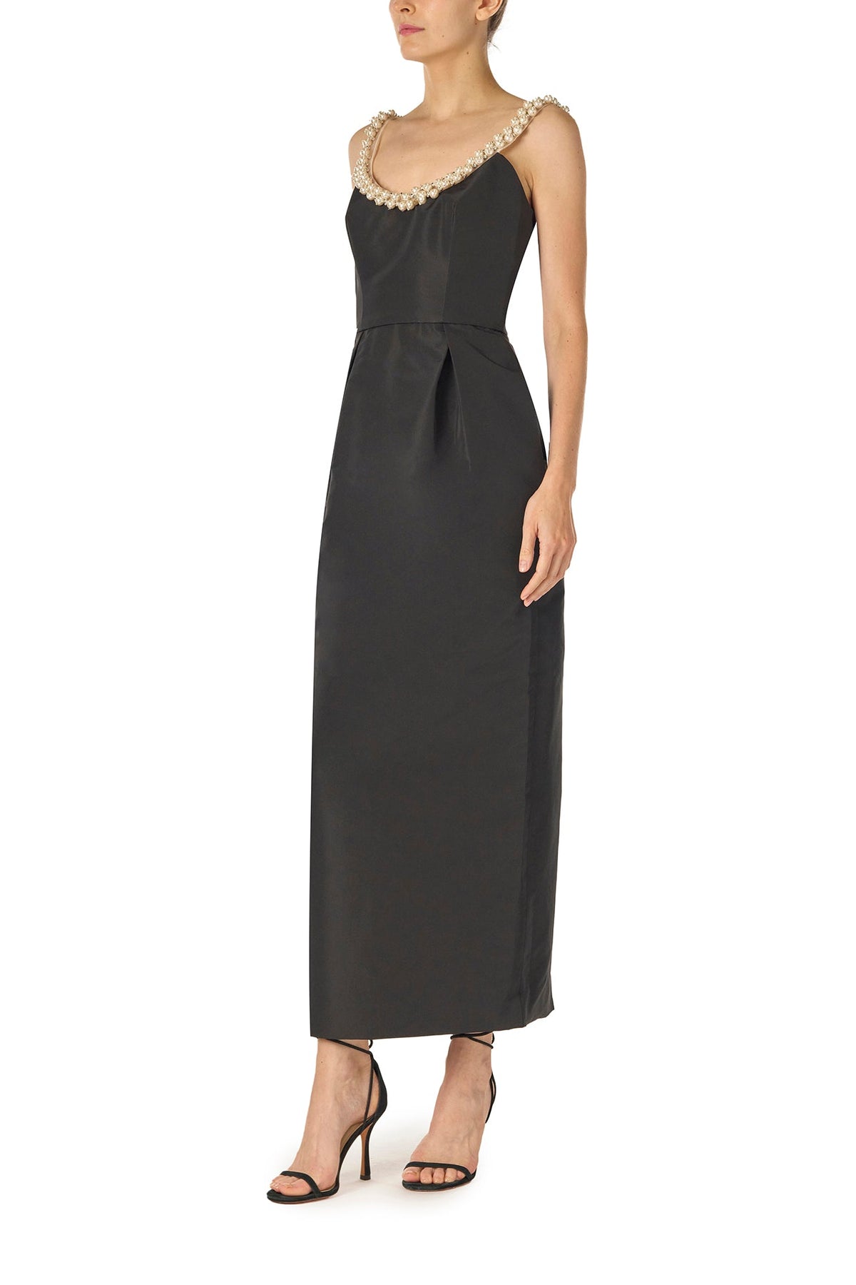 Monique Lhuillier Fall 2024 Sleeveless, scoop neck cocktail dress with pockets and pearl embroidered neckline in noir silk faille - left side.