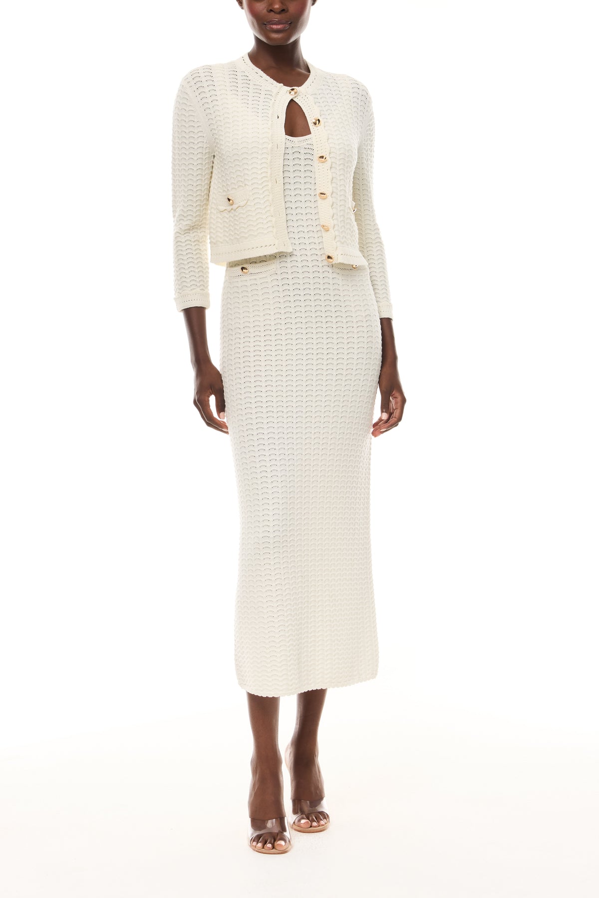 Monique Lhuillier Spring 2026 Ivory Cotton Viscose Knit Lace stitch cardigan with gold buttons with coordinating dress  - front.